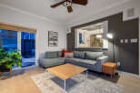 Step into this inviting living space, perfect for relaxation and entertaining.