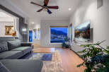 Experience luxury living in this stunning property, featuring a spacious living room with a modern design.
