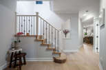 Step into luxury with this stunning property featuring a beautifully designed staircase.