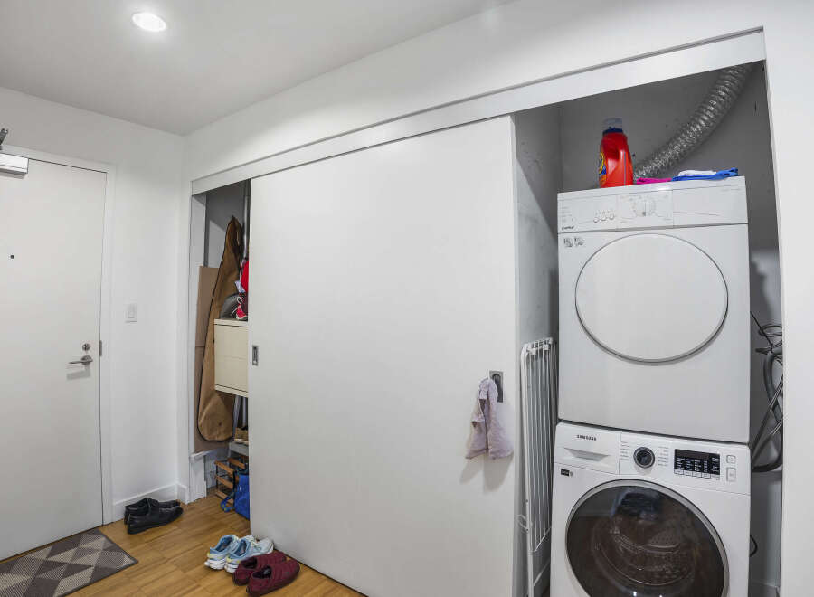 Discover the convenience of in-unit laundry with this modern home! Featuring a stacked washer and dryer, this space-saving setup makes laundry day a breeze.