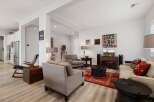 Step into luxury with this stunning living room, featuring a modern design and ample space for relaxation.