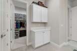 Step into luxury with this stunning property featuring a spacious walk-in closet and ample storage solutions.