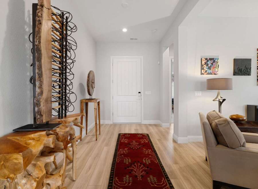 Step into luxury with this stunning property, showcasing a beautifully designed entryway.