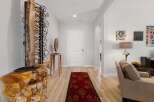 Step into luxury with this stunning property, showcasing a beautifully designed entryway.