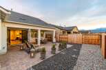 Enjoy outdoor living at its finest in this stunning property! This home features a beautifully designed patio with comfortable seating, perfect for relaxing or entertaining.