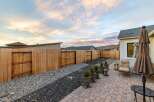 Enjoy the tranquility of this beautifully landscaped backyard.