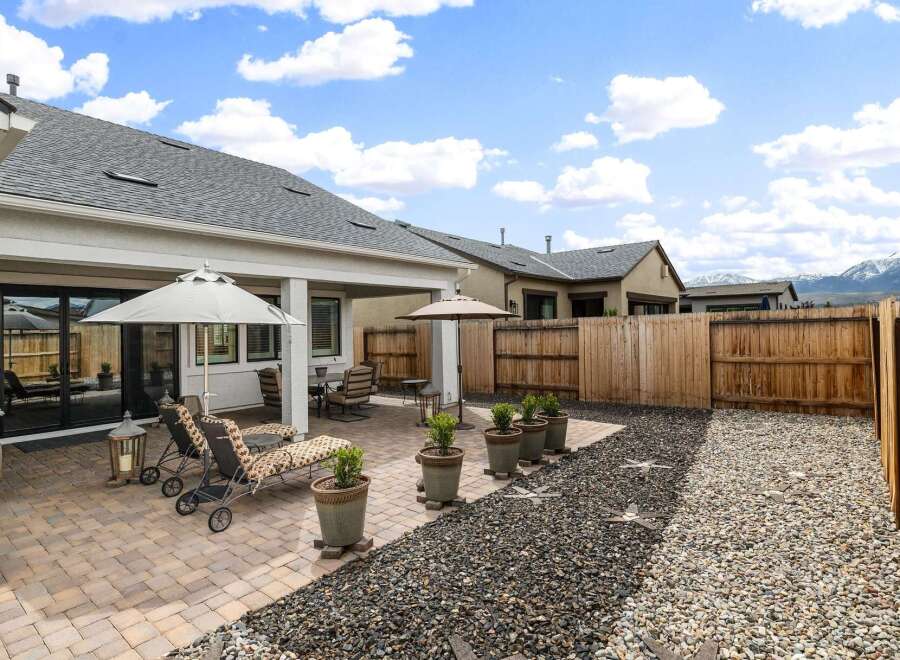 Enjoy outdoor living at its finest in this stunning backyard oasis.