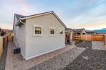 This stunning property boasts a beautifully designed exterior with a modern aesthetic.