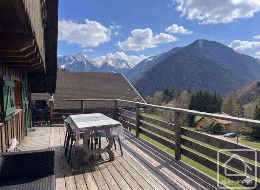 Enjoy breathtaking mountain views from this charming property.