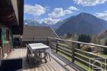 Enjoy breathtaking mountain views from this charming property.