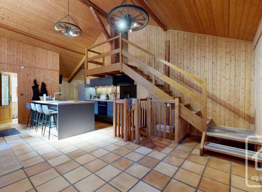 Discover the charm of this stunning property, featuring a beautifully designed interior with wooden accents throughout.