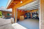 Discover this charming property featuring a spacious garage, perfect for storing vehicles and equipment.