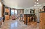 Discover this charming property featuring a cozy living space with wooden floors and a rustic touch.