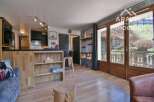 Discover this charming property featuring a cozy interior with wooden accents and a well-equipped kitchen.