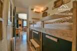 Discover this charming property featuring a cozy bunk bed setup, perfect for family or guest accommodations.