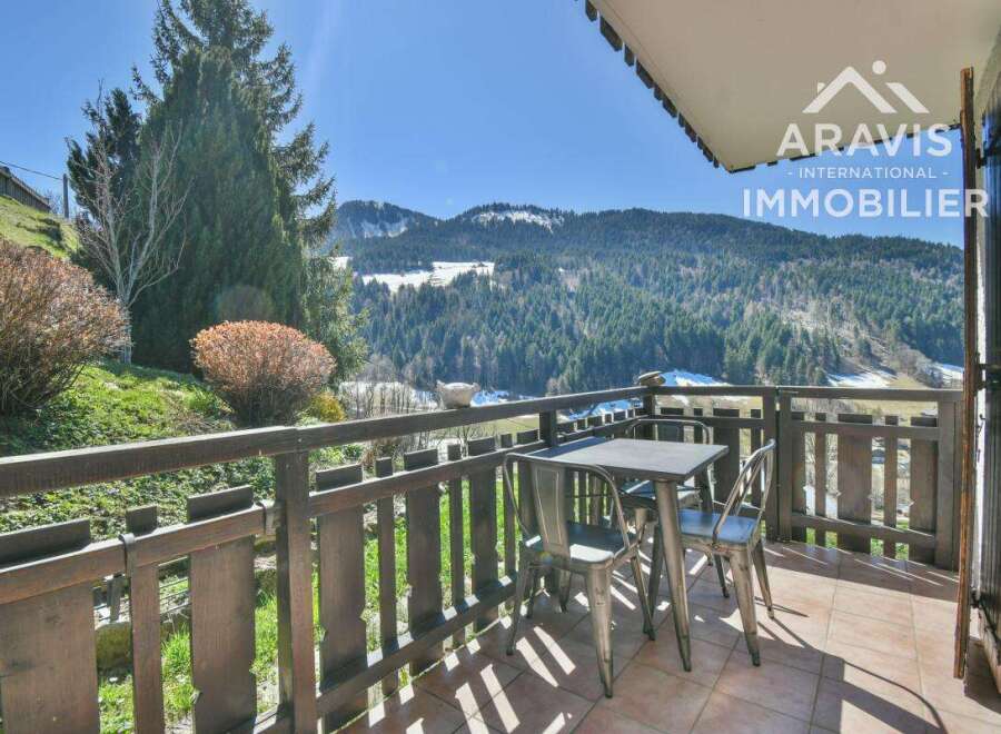 Enjoy breathtaking mountain views from this charming property.