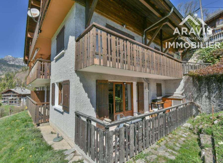 Discover this charming property featuring a traditional wooden balcony and facade, perfect for enjoying the scenic mountain views.