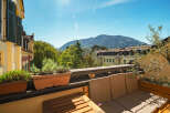 Enjoy breathtaking mountain views from this stunning balcony.