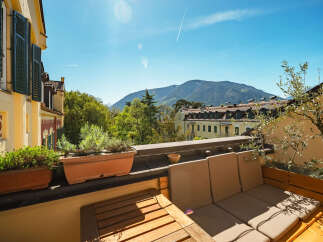 Enjoy breathtaking mountain views from this stunning balcony.