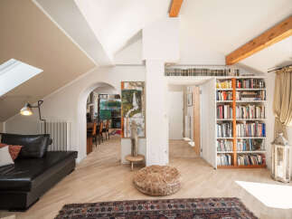 Discover the charm of this stunning property, featuring a bright and airy living space with a unique architectural design.