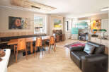 This stunning property boasts a spacious living area, perfect for entertaining or relaxing.