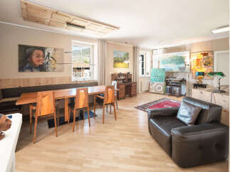 This stunning property boasts a spacious living area, perfect for entertaining or relaxing.
