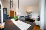 Experience modern living in this stunning property, featuring a spacious open-plan layout perfect for entertaining.