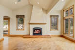 This stunning living space features a cozy fireplace, perfect for chilly evenings.