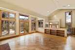 This stunning property boasts a spacious living area with abundant natural light streaming through large windows.