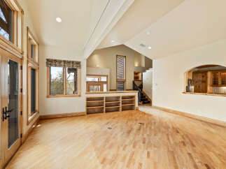 Step into luxury with this stunning property featuring a spacious, open-concept living area.