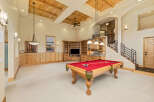This stunning property boasts a luxurious game room, perfect for entertaining and relaxation.