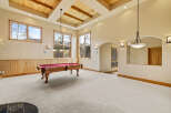 This stunning property boasts a spacious game room, perfect for entertaining and relaxation.