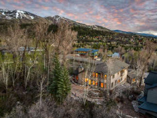 Nestled amidst the stunning mountain landscape, this property offers a serene retreat.