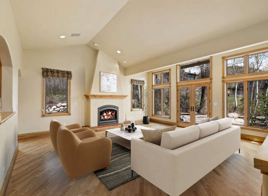 Experience luxury living in this stunning property featuring a cozy fireplace, perfect for chilly evenings.