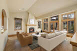 Experience luxury living in this stunning property featuring a cozy fireplace, perfect for chilly evenings.