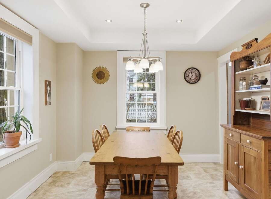 Step into this charming dining room, perfect for family gatherings and entertaining guests.