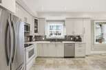 This stunning kitchen boasts modern design and functionality.