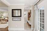 This inviting entryway showcases a blend of style and functionality, perfect for welcoming guests.