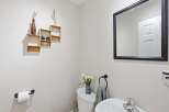 This stunning bathroom features a modern design with a touch of rustic charm.