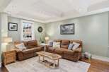 Step into this inviting living room, perfect for relaxation and entertaining.