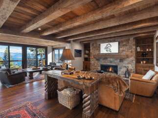 Experience the epitome of rustic luxury in this stunning living room.