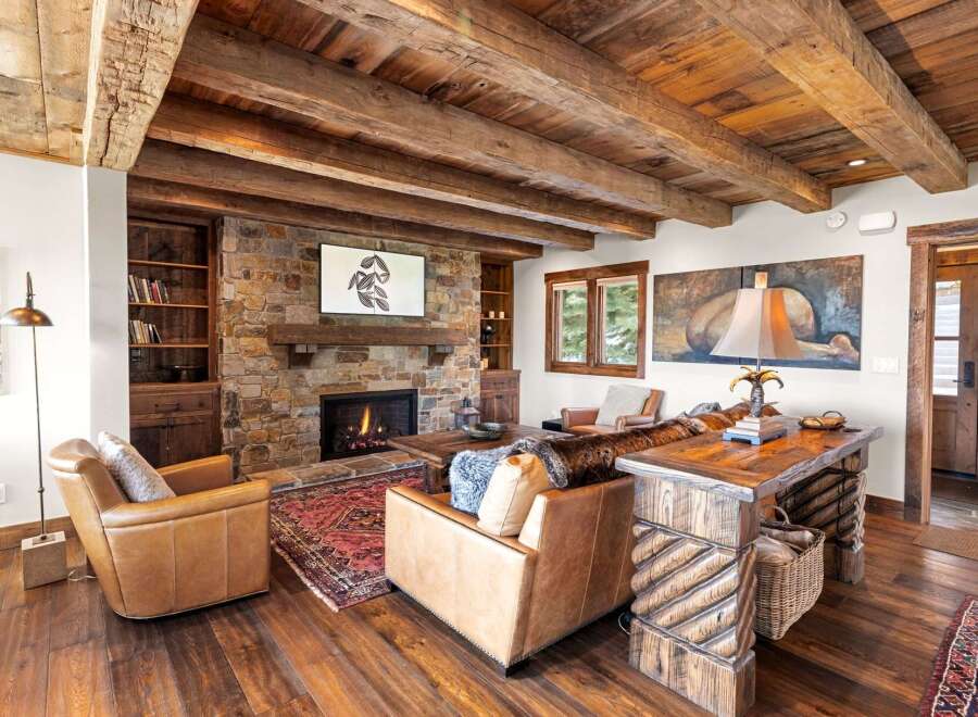Step into luxury with this stunning property featuring a cozy fireplace, perfect for chilly evenings.