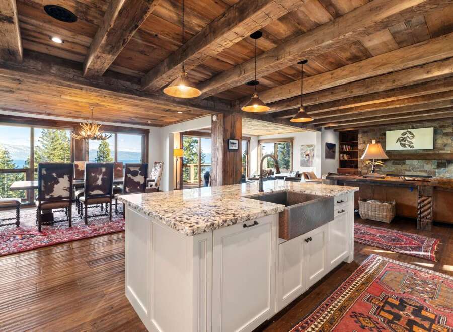 Experience luxury living in this stunning home featuring a gourmet kitchen with a spacious island and high-end appliances.