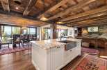 Experience luxury living in this stunning home featuring a gourmet kitchen with a spacious island and high-end appliances.
