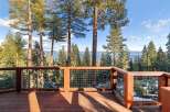 Enjoy breathtaking views from this stunning property, featuring a spacious deck perfect for entertaining or relaxing.