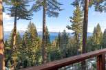 Enjoy breathtaking views of the lake and surrounding mountains from this stunning property.