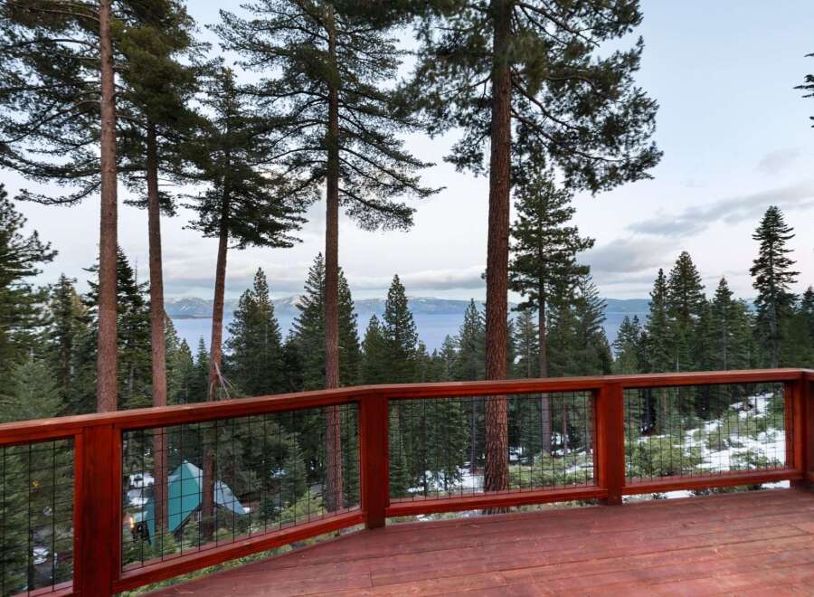 Enjoy breathtaking views from this stunning property, featuring a spacious deck perfect for entertaining or relaxing.
