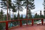 Enjoy breathtaking views from this stunning property, featuring a spacious deck perfect for entertaining or relaxing.