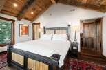 Experience rustic elegance in this stunning bedroom.