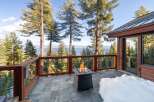 Enjoy breathtaking views from this stunning property, featuring a cozy outdoor fire pit perfect for chilly evenings.